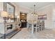 Charming dining room with table, buffet, and unique chandelier lighting at 1007 Southwest Dr, Davidson, NC 28036