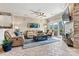 Relaxing living room with tile floors, fireplace, comfortable seating, and sliding glass doors to the patio at 1007 Southwest Dr, Davidson, NC 28036