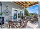 Covered patio features patio seating, a ceiling fan, and a community view at 1007 Southwest Dr, Davidson, NC 28036