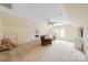 Spacious bonus room with neutral walls, plush carpet and natural light at 10918 Megwood Dr, Charlotte, NC 28277