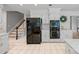 A modern kitchen features stainless appliances and white cabinetry at 10918 Megwood Dr, Charlotte, NC 28277