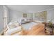 Bright living room with hardwood floors, neutral walls, and comfortable seating at 10918 Megwood Dr, Charlotte, NC 28277