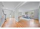Spacious living room with hardwood floors and an open layout with ample light at 10918 Megwood Dr, Charlotte, NC 28277