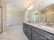 Bright bathroom with double vanity, granite countertop, a soaking tub, and a glass-enclosed shower at 11507 Valley Oak Ln, Stanfield, NC 28163