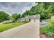 Charming home with a well-manicured lawn, a double garage, and a welcoming curb appeal at 11615 Chadburn Ln, Charlotte, NC 28215