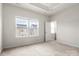 Bedroom with neutral carpet and two bright windows, complemented by natural light at 1204 May Apple Dr, Matthews, NC 28104