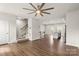 Bright open living space with hardwood floors, kitchen and stairs at 1204 May Apple Dr, Matthews, NC 28104