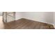 Hardwood floors and white molding accent the staircase area at 1204 May Apple Dr, Matthews, NC 28104