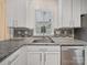 Bright kitchen showcasing granite countertops, stainless steel appliances, and modern cabinetry at 1228 Rising Oak Dr, Charlotte, NC 28206
