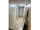 Neutral hallway features tile flooring and multiple entryways at 1250 Landsdowne Dr, Conover, NC 28613