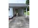 Spacious covered carport, perfect for parking and protection from the elements at 1314 Hathcock Ave, Albemarle, NC 28001