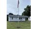 Charming single-story home featuring a well-maintained lawn, flagpole, and convenient carport at 1314 Hathcock Ave, Albemarle, NC 28001