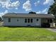 Charming single story home featuring a covered carport and lush front lawn at 1314 Hathcock Ave, Albemarle, NC 28001