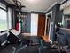 Home gym featuring weightlifting equipment, natural light and access to additional rooms at 1314 Hathcock Ave, Albemarle, NC 28001