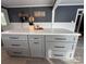 Spacious kitchen island with stone countertops and ample storage in a modern home at 1314 Hathcock Ave, Albemarle, NC 28001
