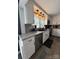 Bright kitchen with stainless steel appliances and stone countertops, ready for cooking and entertaining at 1314 Hathcock Ave, Albemarle, NC 28001