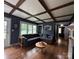 Spacious living room with coffered ceilings, hardwood floors, natural light, and neutral decor at 1314 Hathcock Ave, Albemarle, NC 28001