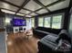 Comfortable living room with coffered ceiling, hardwood floors and large windows offering ample natural light at 1314 Hathcock Ave, Albemarle, NC 28001