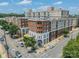 An aerial view of a stylish brick apartment complex in the Dilworth neighborhood at 1315 East Blvd # 327, Charlotte, NC 28203