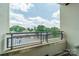 Balcony offers views of the neighborhood and trees, perfect for relaxing outdoors at 1315 East Blvd # 327, Charlotte, NC 28203