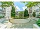 Courtyard featuring beautiful planters and landscaping, creating a peaceful outdoor oasis at 1315 East Blvd # 327, Charlotte, NC 28203