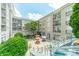Enjoy this spacious courtyard with picnic tables, landscaping, and stairs for access at 1315 East Blvd # 327, Charlotte, NC 28203
