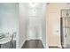 Bright entryway showcasing a white door and an open layout flowing into the living spaces at 1315 East Blvd # 327, Charlotte, NC 28203