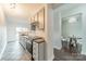 Updated kitchen with stainless steel appliances, granite countertops, and open layout to dining area at 1315 East Blvd # 327, Charlotte, NC 28203