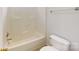 Standard bathroom featuring a bathtub with shower and a white toilet at 15280 Leslie Brook Rd, Huntersville, NC 28078