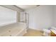 Bathroom with a tub, separate shower, and a window that provides natural light at 15280 Leslie Brook Rd, Huntersville, NC 28078