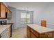 Bright kitchen featuring an island, stainless steel appliances, and breakfast nook at 15280 Leslie Brook Rd, Huntersville, NC 28078