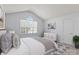 Bright, carpeted primary bedroom with vaulted ceiling and large window at 15280 Leslie Brook Rd, Huntersville, NC 28078