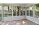 Sunroom with multiple windows providing a great view of the fenced yard at 15280 Leslie Brook Rd, Huntersville, NC 28078