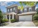 Beautiful brick home with a spacious two-car garage and well-manicured front yard at 15636 Oleander Dr, Charlotte, NC 28278
