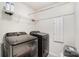 Laundry room showcasing a Samsung washer and dryer set with a white wire rack above at 15636 Oleander Dr, Charlotte, NC 28278