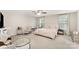Spacious main bedroom featuring neutral decor, plush carpet, and lots of natural light at 15636 Oleander Dr, Charlotte, NC 28278