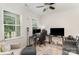 Home office space with two large windows, computer setup with dual monitors, and comfortable seating at 15636 Oleander Dr, Charlotte, NC 28278