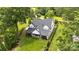 Stunning two-story home featuring a modern design, a beautifully landscaped yard, and a charming outdoor patio at 16112 Terry Ln, Huntersville, NC 28078