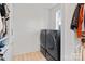 Laundry area featuring a black washer and dryer set and closet storage space at 16112 Terry Ln, Huntersville, NC 28078