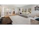 Bright living room with neutral decor, a large comfortable sofa, and ample natural light at 16112 Terry Ln, Huntersville, NC 28078