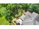 Aerial shot showcases the landscaped backyard, patio area, and architectural roof details of the home at 174 Hickory Hill Rd, Mooresville, NC 28117