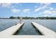 Dock with swim ladder perfect access to the lake for swimming and boating at 174 Hickory Hill Rd, Mooresville, NC 28117