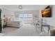 Bright bedroom with a lake view, complemented by a desk area and a large window, creating a relaxing atmosphere at 18007 Harbor Light Blvd, Cornelius, NC 28031