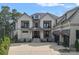 A gorgeous two story home with black trim, a three car garage, and a spacious new concrete driveway at 18007 Harbor Light Blvd, Cornelius, NC 28031
