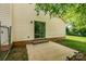 Spacious backyard patio with sliding door access and ample room for outdoor enjoyment at 1801 Teddington Dr, Charlotte, NC 28214