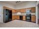 Functional kitchen with stainless steel appliances, granite countertops, and ample cabinet space at 1801 Teddington Dr, Charlotte, NC 28214