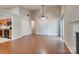 Spacious living room with vaulted ceilings, fireplace, and hardwood floors at 1801 Teddington Dr, Charlotte, NC 28214