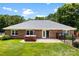 Relaxing backyard with a hot tub, well maintained yard, and privacy fence at 1958 Cameron Heights Cir, Denver, NC 28037