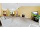Large open concept living room with fireplace, dining area, and lots of natural light at 1958 Cameron Heights Cir, Denver, NC 28037
