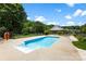 Enjoy the outdoors with this refreshing in-ground pool with a concrete border and partial fence at 1958 Cameron Heights Cir, Denver, NC 28037